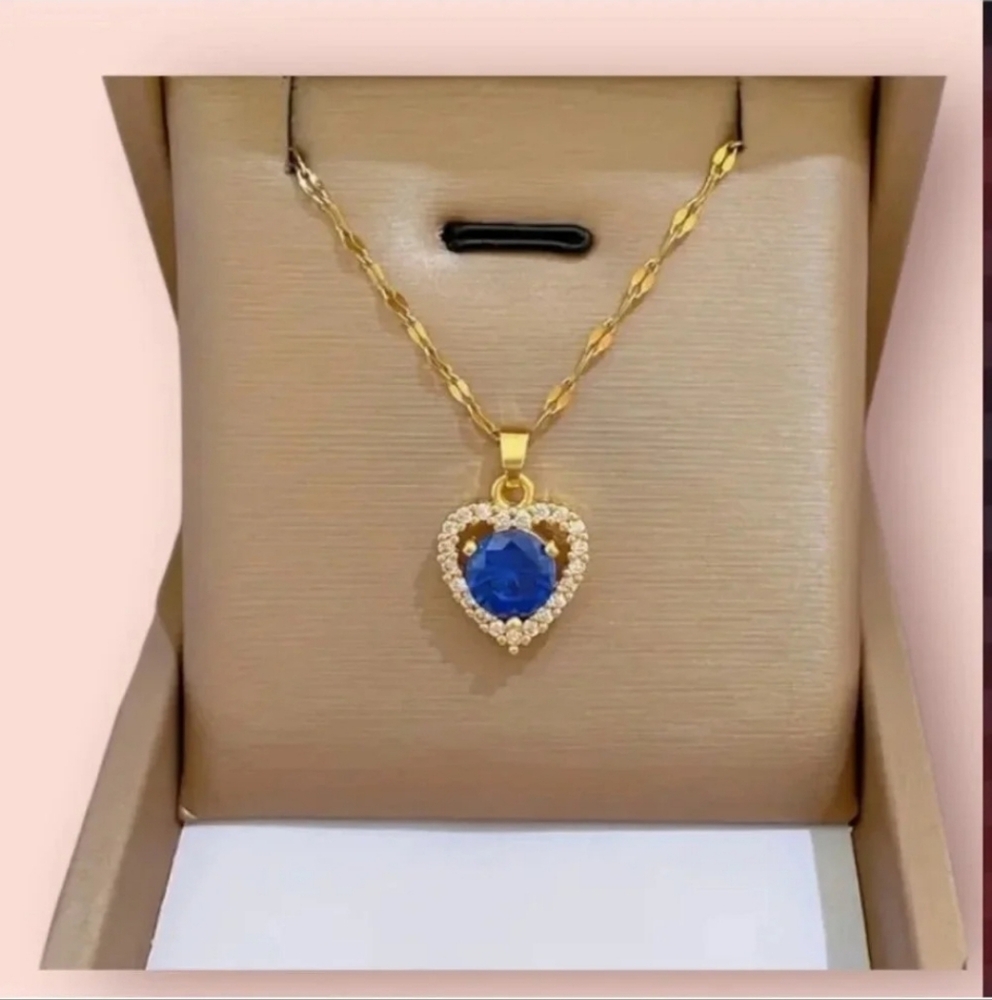 NWT Elegant Gold Colored Heat Necklace With Blue Gemstome